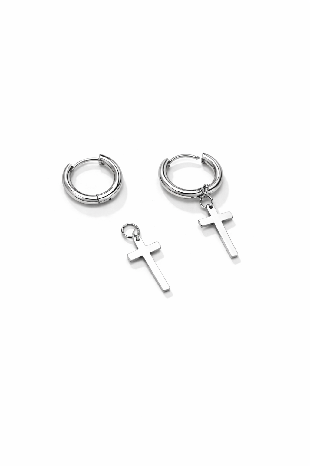 CARRIED CROSS EARRING
